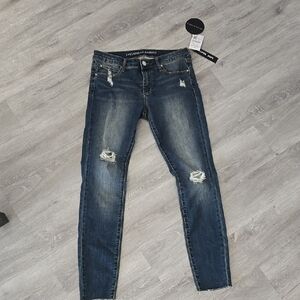 Distressed Blue Jeans